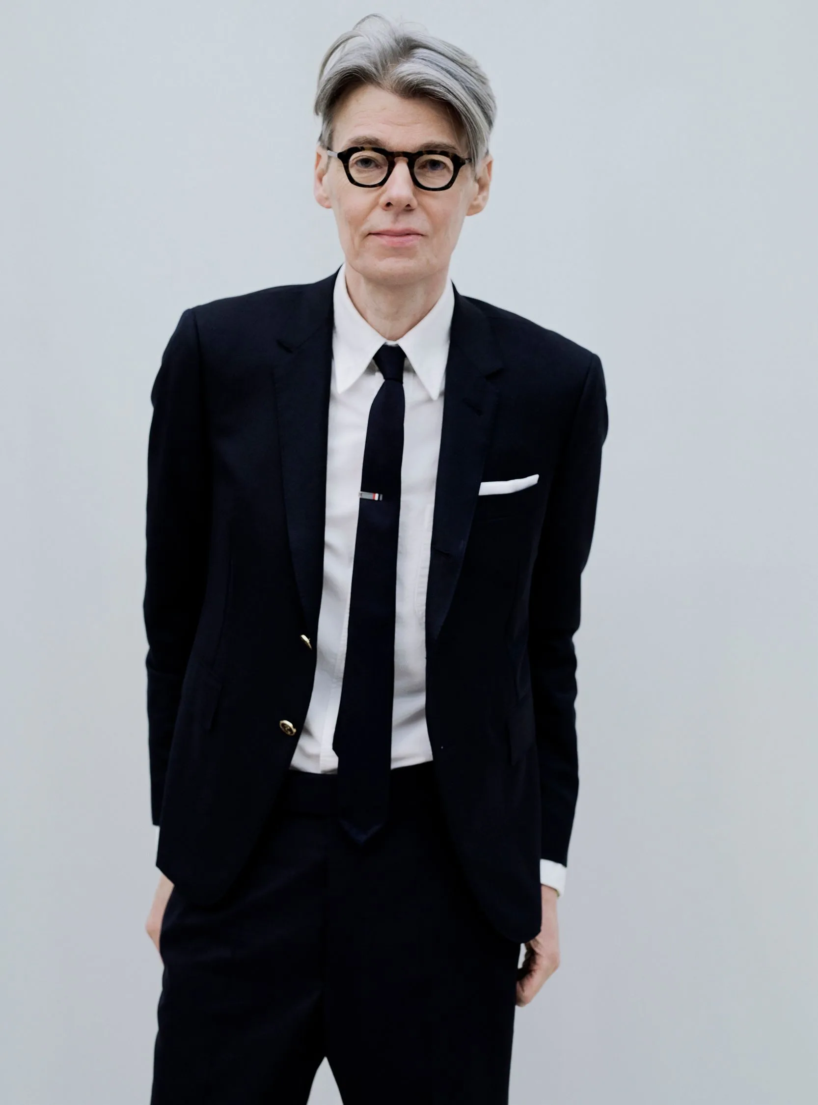 Image may contain Andrew Bolton Blazer Clothing Coat Jacket Formal Wear Suit Accessories Tie Adult and Person