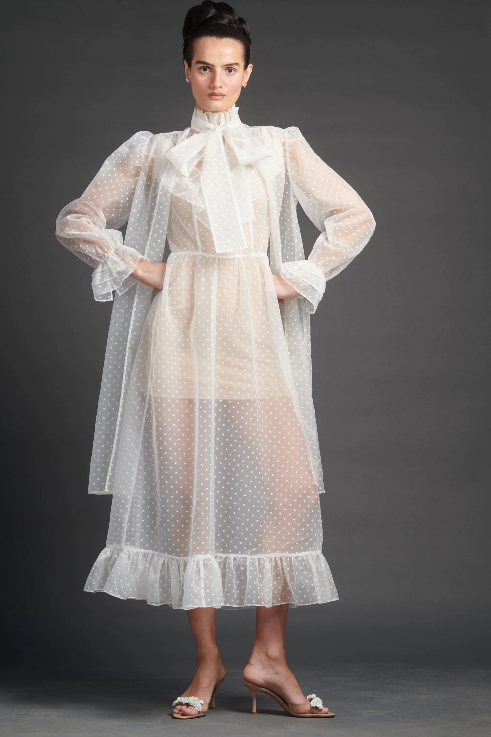 Image may contain Fereshteh Karimi Blouse Clothing Dress Person Formal Wear and Fashion