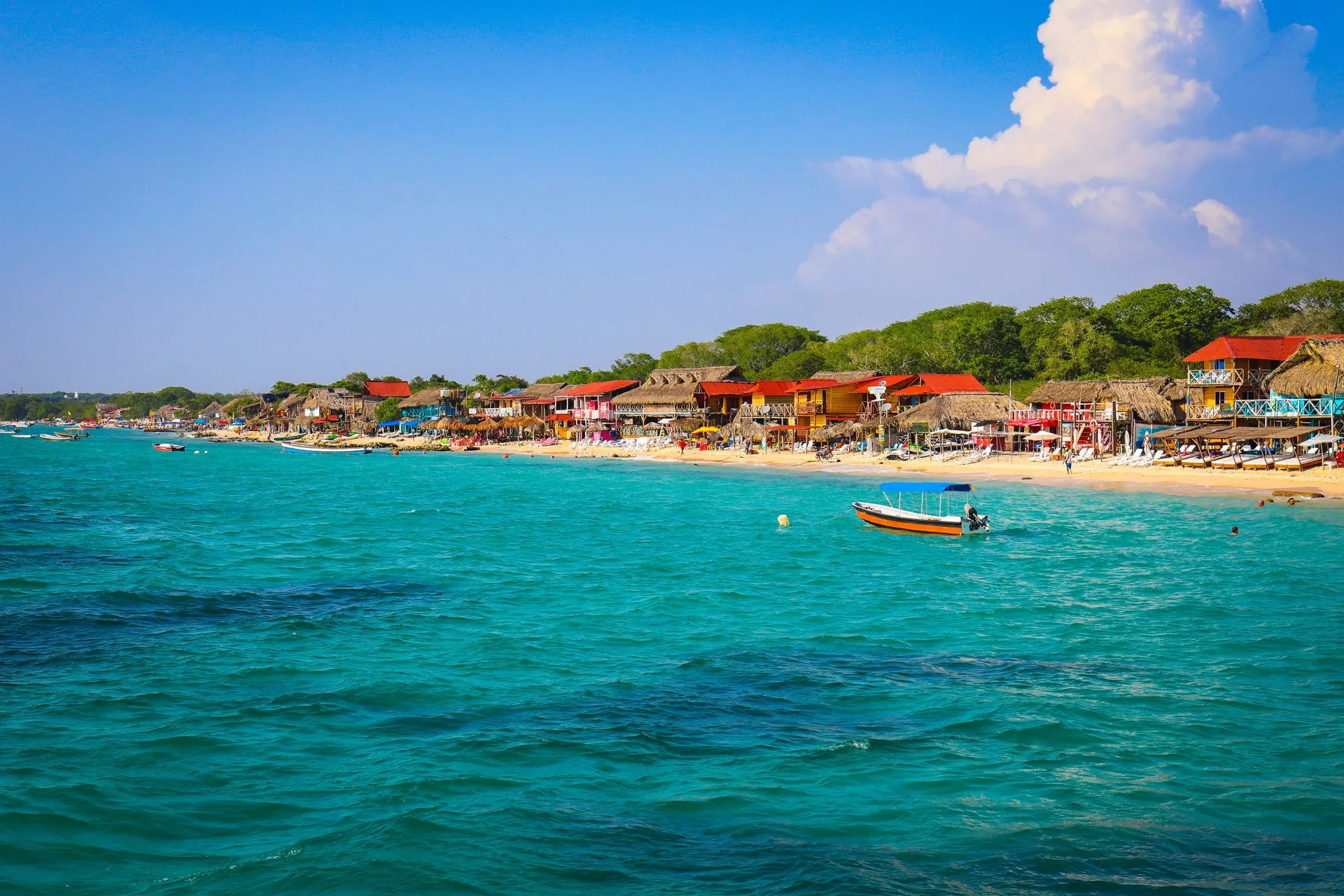 Image may contain Nature Outdoors Sea Water Summer Beach Coast Shoreline Sky Boat Transportation and Vehicle