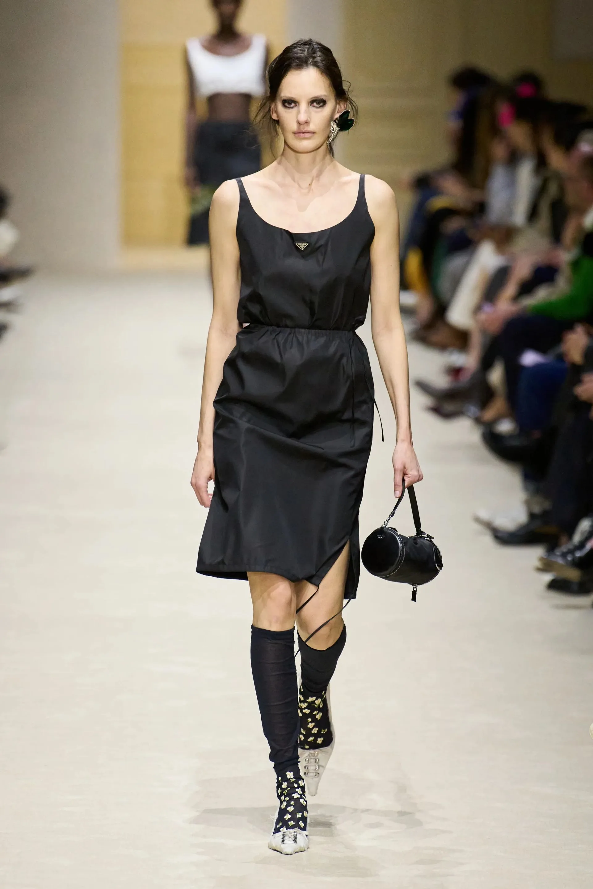 Image may contain Adult Person Fashion Clothing Dress and Runway