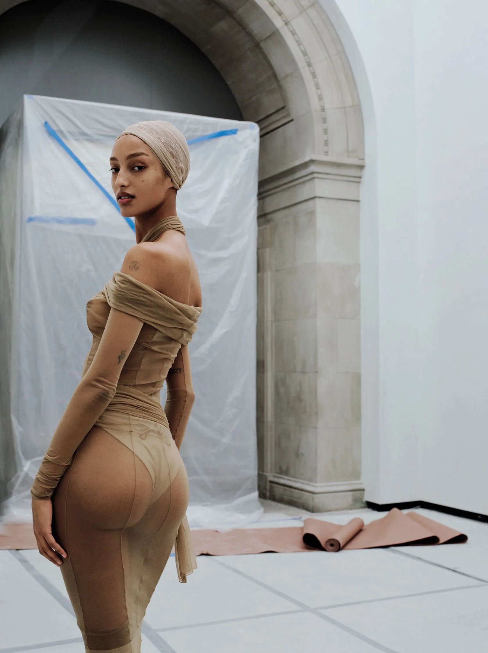 Image may contain Adult Person Clothing Swimwear Blonde Hair Hat Bathing Cap Cap and Sleeve