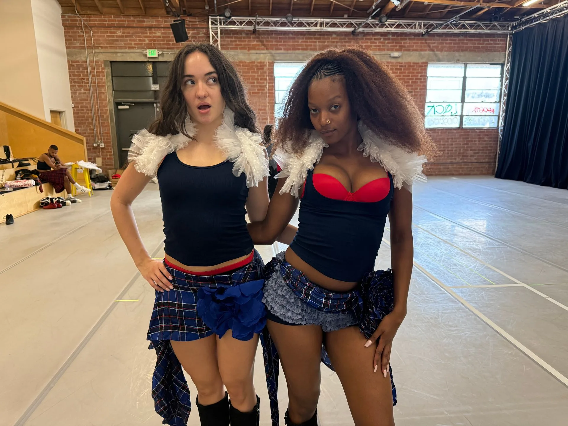 Image may contain Clothing Skirt Miniskirt Adult Person Shorts Face Head Photography Portrait and Costume